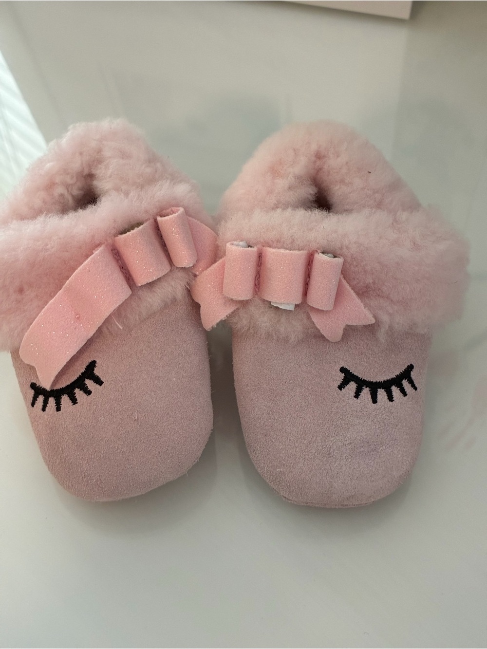 UGG Pink Bow Shearling Baby Slippers
